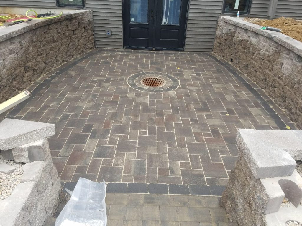 patio pavers drainage Herstad Landscaping 6089215349